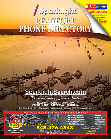 Marina with boats docked and sunrise