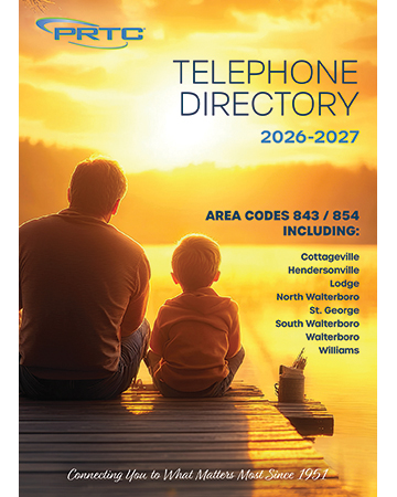 man and boy on a dock at sunset